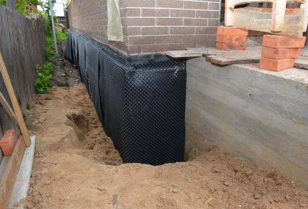 Happy homeowners after waterproofing job in Thompson's Station